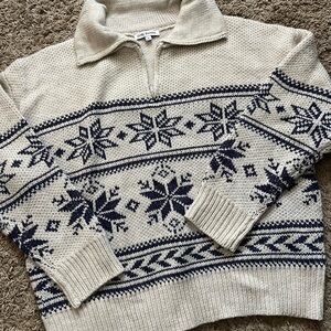 Elegant Cream and Black V-Neck Sweater